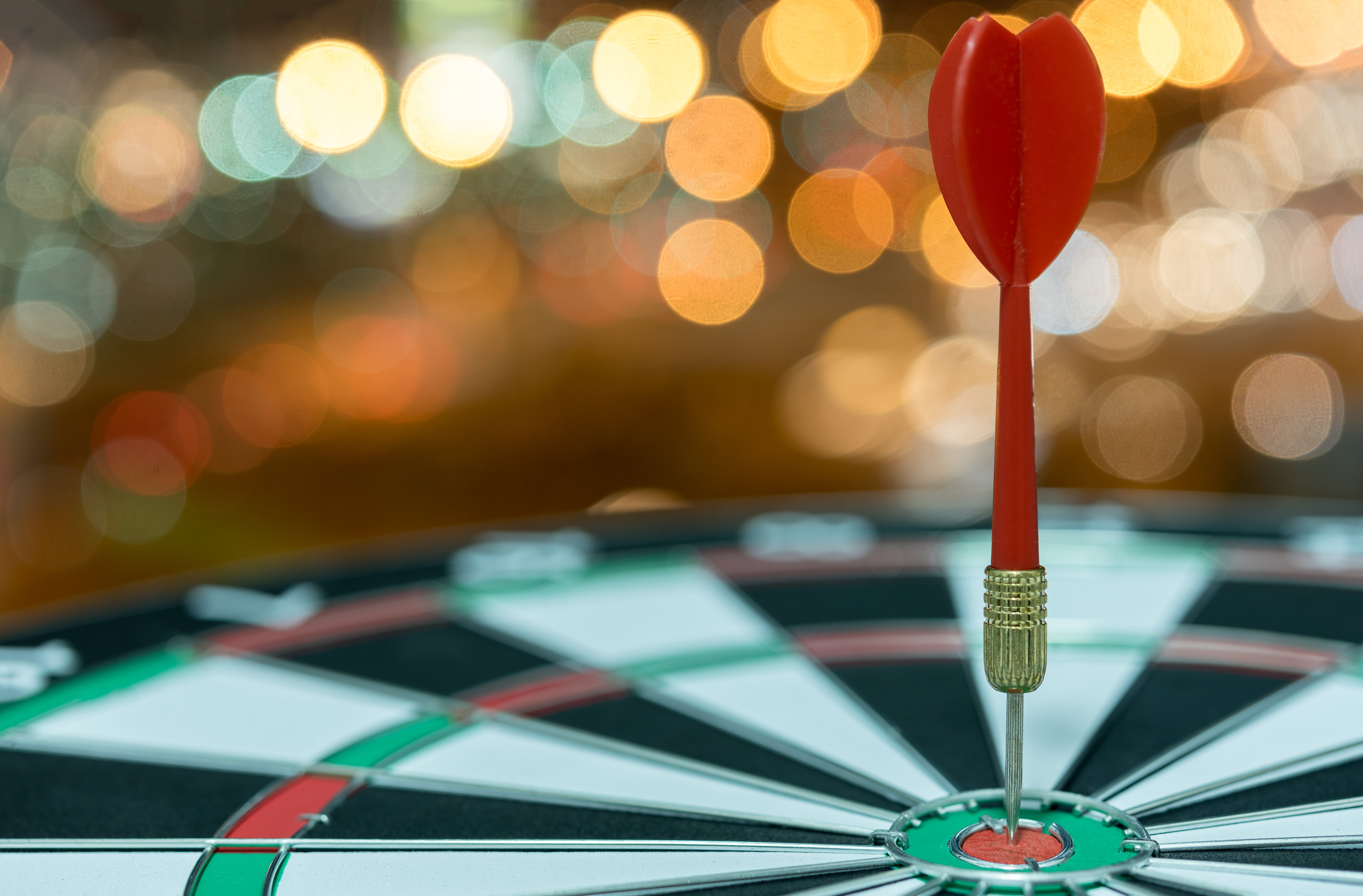 dart-target-arrow-bullseye-bokeh-background-jpg